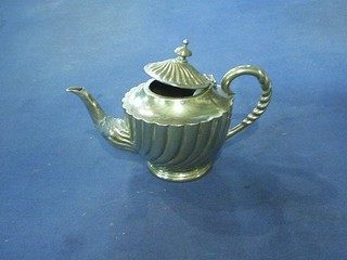 A circular silver plated teapot with reeded decoration and 2 sewing implements (f and r)