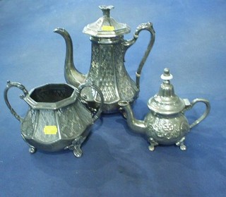 A Victorian Britannia metal coffee pot, matching sugar bowl and a silver plated coffee pot