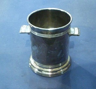 An Art Deco twin handled silver plated wine coaster 6"