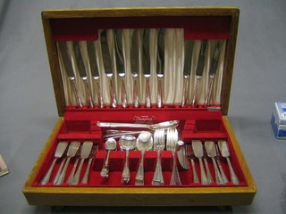 A canteen of silver plated cutlery contained in an oak canteen box