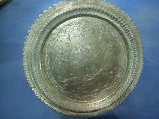 An Eastern circular silver salver decorated figures with pierced border 12", 16 ozs