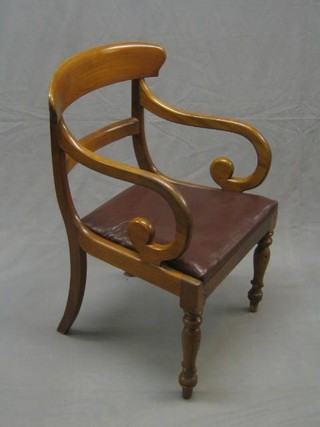 A William IV bleached mahogany open arm carver chair with plain mid rail and upholstered seat, on turned supports