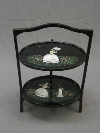 A 1930's Art Deco 2 tier cake stand with silvered paper decoration, decorated a Crinoline lady 18"