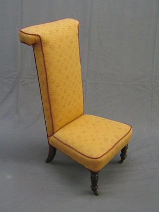A Victorian mahogany framed pri dieu chair, upholstered in tapestry material