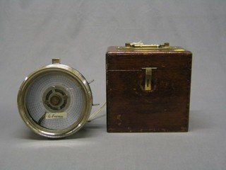 A racing pigeon clock "The Automatic Timing Clock" contained in a chromium plated case with oak carrying case