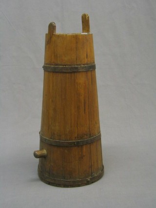 A waisted coopered barrel with spicket 19"