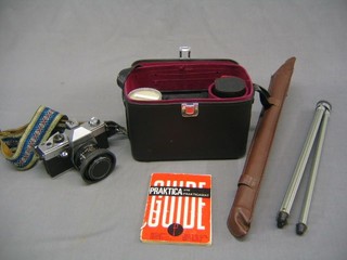 A Praktica Super LTII camera, cased together with tripod
