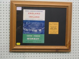 A 1957 England V Ireland Football Association International programme to the reverse of a framed ticket and photocopy of programme