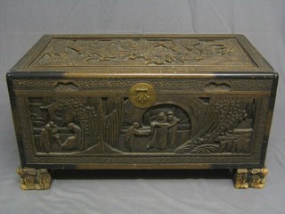 A 19th/20th Century Hong Kong carved camphor wood coffer with hinged lid 40"