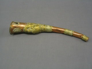 A 20th Century Tibetan embossed copper and brass horn