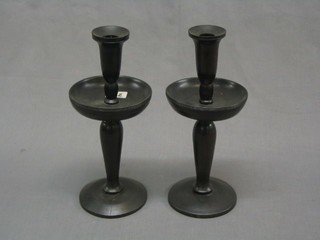 A pair of 17th Century style turned mahogany candlesticks 12"