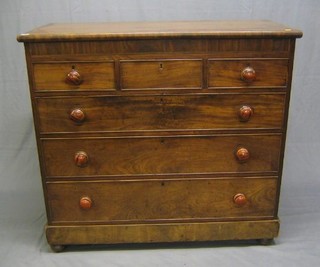 A Victorian mahogany chest fitted a secret drawer, 3 short drawers and 3 long drawers with tore handles, raised on bun feet 48"