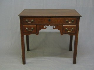 An 18th Century oak low boy fitted 1 long drawer above 2 short drawers, raised on square tapering supports 31"