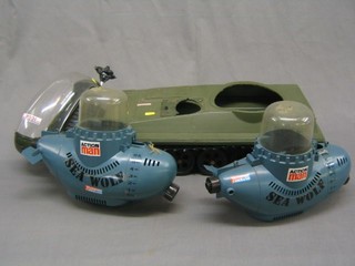 An Action Man half track, 2 Action Man submarines and a helicopter (all f)