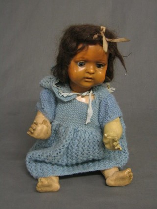 A composition doll with open eyes, head marked Schutz Marke