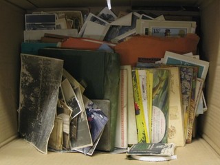 A collection of postcards, photographs etc