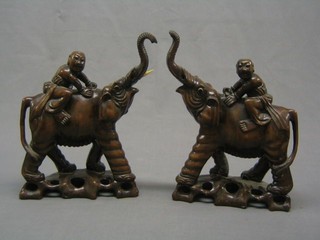 A pair of 19th Century Japanese carved rootwood figures of elephants with attendants 12" (tusks f)