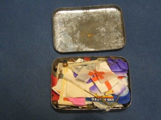 A 1930's Tabloid tea tin containing WWII National map flags