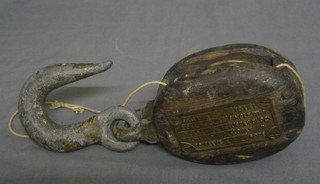 A 19th/20th Century wooden block and eye, marked Pat 1D