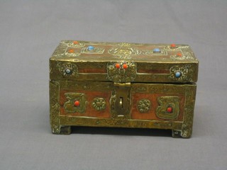 A Tibetan rectangular copper and brass trinket box with hinged lid inset hardstones 8"