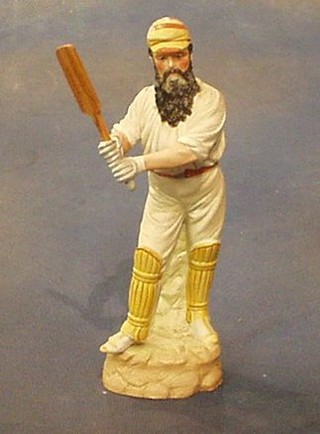 A 19th Century German biscuit porcelain figure of W G Grace wearing MCC cap at the wicket, the base marked Grace The Cricketer, 9"