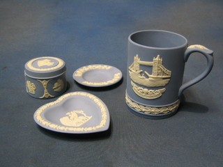 A 1975 Wedgwood blue Jasperware tankard decorated Tower Bridge, 2 ashtrays and a small jar and cover