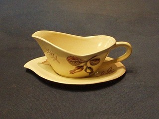 A Carltonware sauce boat on a leaf shaped stand