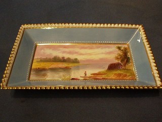A 19th Century rectangular Copeland porcelain tray, painted a landscape with river within  purple and gilt banding, raised on 4 bun feet, the base marked Copeland China and impressed F89, 10"