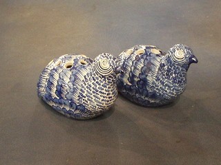 A pair of 19th Century blue glazed pottery figures of seated grouse 6"