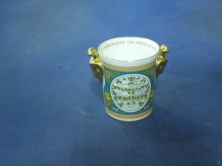A Coalport limited edition twin handled porcelain beaker to commemorate the birth of Prince William, retailed by Peter Jones