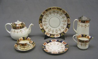 A 35 piece Royal Staffordshire china Derby style tea service comprising teapot, cream jug, hotwater jug, teapot stand, 2 circular plates 9 1/2", 11 tea plates 6 1/2", 10 cups (3 cracked) 12 saucers (1 cracked)