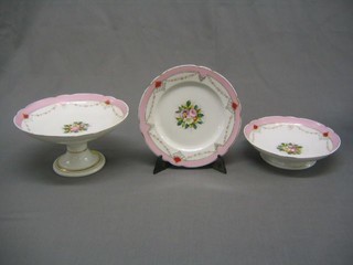 A 15 piece Continental porcelain dessert service with pink banding and floral decoration, comprising 9" tazza, 4 bowls 8", 10 plates 8 1/2" (some rubbing to gilding) 