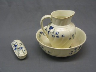 A blue and white floral pattern jug and bowl set (f) and a rectangular soap dish