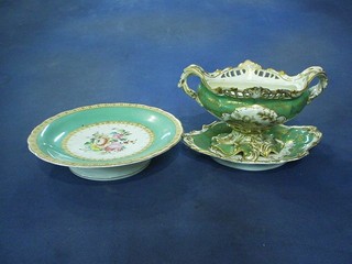 A 19th Century Rockingham style boat shaped sauce tureen and stand decorated a landscape (no lid (f and r), together with a 19th Century 7 piece porcelain dessert service with floral decoration, green and gilt banding - 2 comports and 6 plates