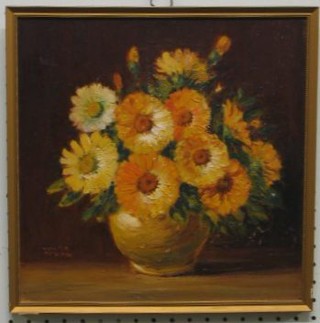 An oil painting on board "Vase of Sun Flowers" 12" x 12" indistinctly signed