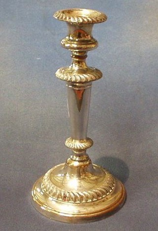 A 19th Century silver plated candlestick 8"