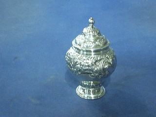 A Victorian  circular embossed silver caddy London 1890 (some holes) 6 ozs
