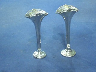 A pair of Edwardian silver specimen vases with flared and pierced mouths Birmingham 1909 and 1910 (1f) 6"