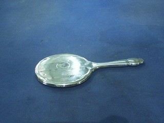 An Art Deco silver backed hand mirror with engine turned decoration Chester 1922