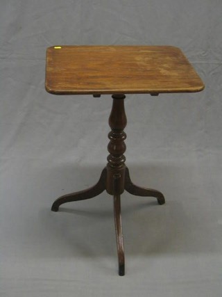 A 19th Century rectangular snap top wine table, raised on pillar and tripod supports 20"