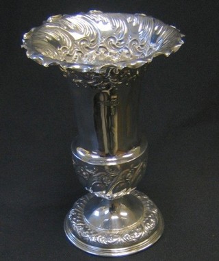 A matched set of 2 Victorian and 1 Edwardian embossed silver trumpet shaped vases, Sheffield 1897 4 1/2" and Sheffield 1907 7", 11 ozs