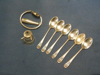 A miniature silver pepper, a silver cigarette/cheroot holder contained in a silver case, 6 silver coffee spoons and a lady's gilt cased wristwatch