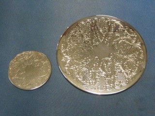 12 circular engraved silver plated place mats 7 1/2" and 12 ditto bottle coasters 3 1/2"