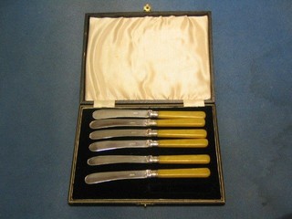 A set of 6 silver plated tea knives and forks, cased and a set of 6 silver plated fish knives and forks cased