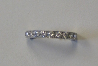 A lady's full eternity ring set numerous diamonds in white gold