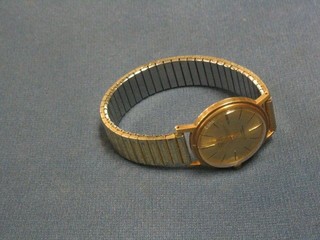 A gentleman's automatic wristwatch  by Winegartens Ltd contained in a gold case