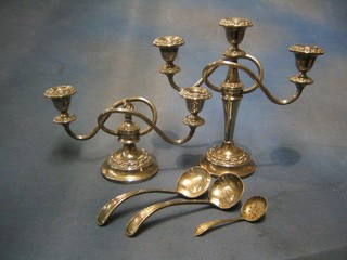 A 3 light silver plated candelabrum and 1 other and a pair of sauce ladles and a sifter spoon