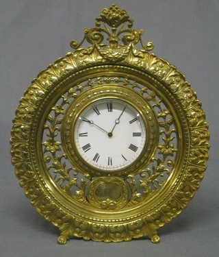 A French 19th Century 8 day desk clock with porcelain dial and Roman numerals, contained in a circular pierced brass case, the movement marked EGL