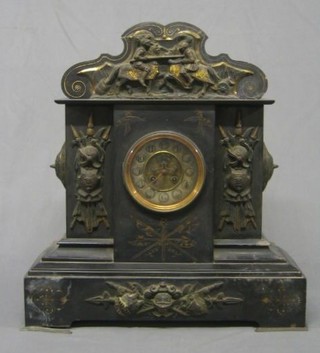 A 19th Century 8 day striking mantel clock contained in a black marble case with embossed gilt decoration of jousting knights and military trophies, the circular dial with visible escapement and Arabic numerals