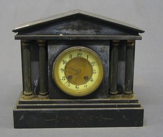 A 19th Century French 8 day striking mantel clock with porcelain dial and Arabic numerals, contained in a black marble architectural case